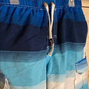 B. Split Men’s Swim Trunks